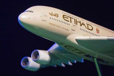 A model Etihad Airways plane is seen on stage before the unveiling of the new home jersey for the New York City Football Club in New York Nov 13, 2014. REUTERS/FILE PHOTO