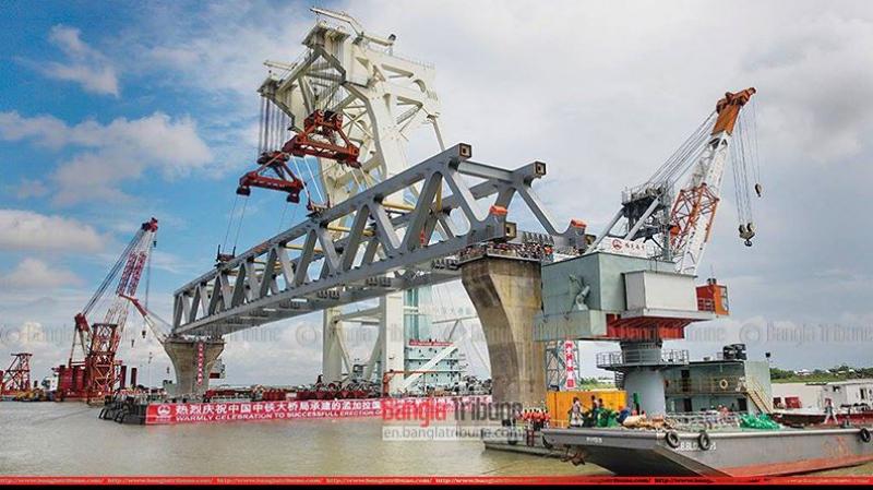 Padma Bridge becomes visible with the installation of the first span at the Jajira point in Shariatpur