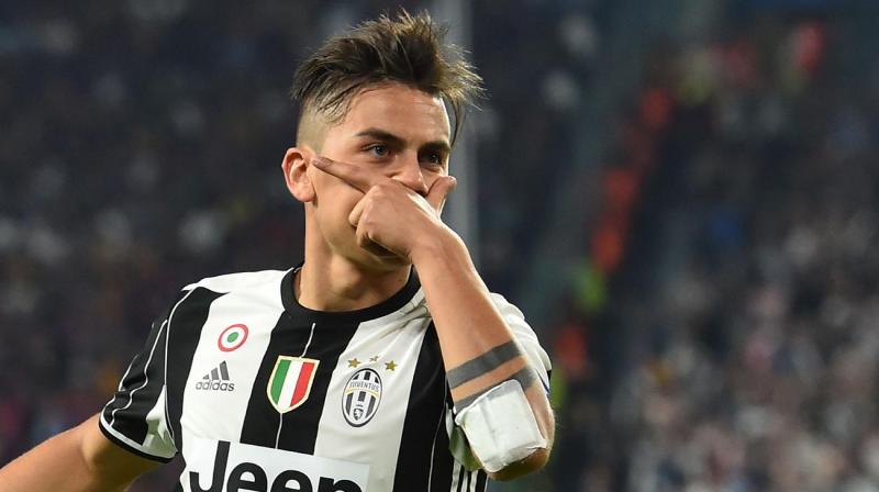 Paulo Dybala in his trade mark goal celebration (Photo Collected)