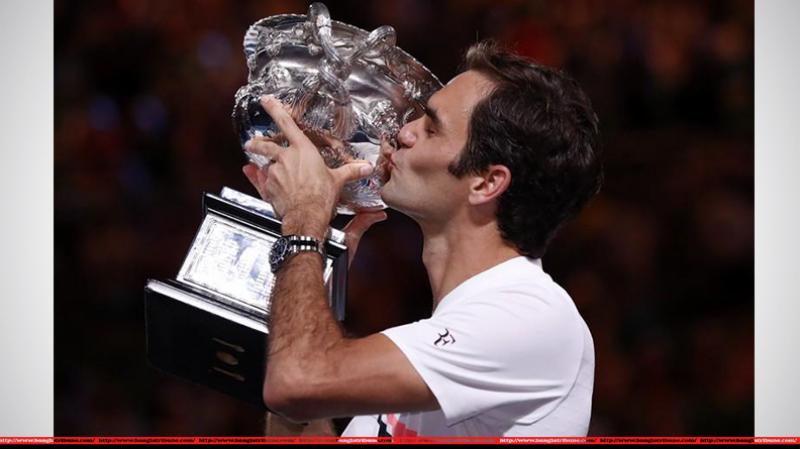 Switzerland`s Roger Federer celebrates with the trophy after winning the final against Croatia`s Marin Cilic (Photo: Reuters)