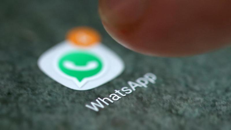 WhatsApp app logo is seen on a smartphone/Reuters