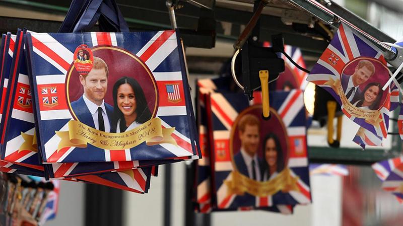 Commemorative items are seen for sale ahead of the forthcoming wedding of Britain`s Prince Harry and his fiancee Meghan Markle, on Oxford Street in London, Britain, May 11, 2018. REUTERS