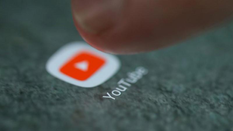 The YouTube app logo is seen on a smartphone in this picture illustration taken September 15, 2017. REUTERS
