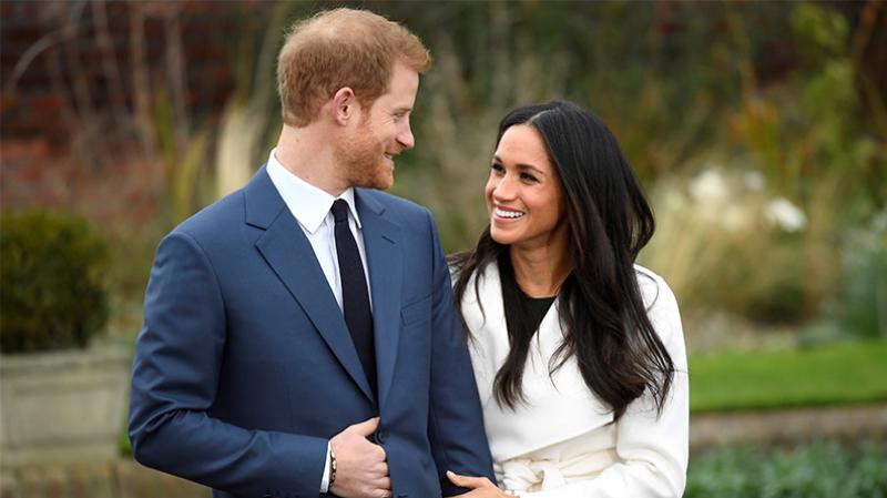 Prince Harry poses with Meghan Markle in the Sunken Garden of Kensington Palace, London, November 27, 2017. REUTERS File Photo