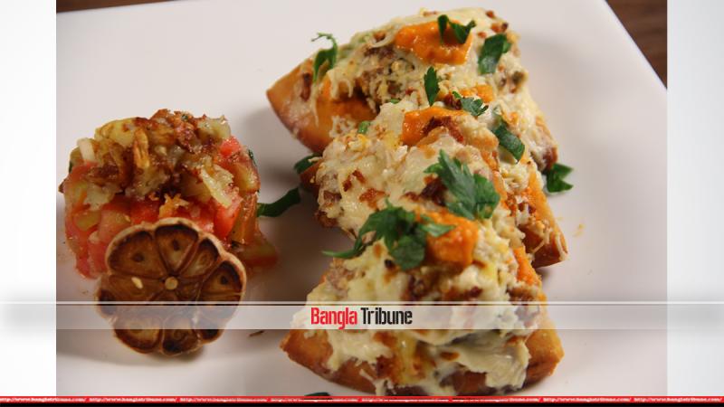 Crispy pizza with Tomato salsa. BANGLATRIBUNE/Fatema Abedin