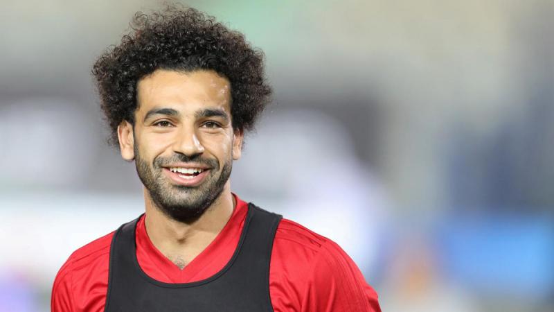 Egypt`s Mohamed Salah smiles next to his teammates in Cairo international stadium in Cairo on June 9, 2018. Reuters.