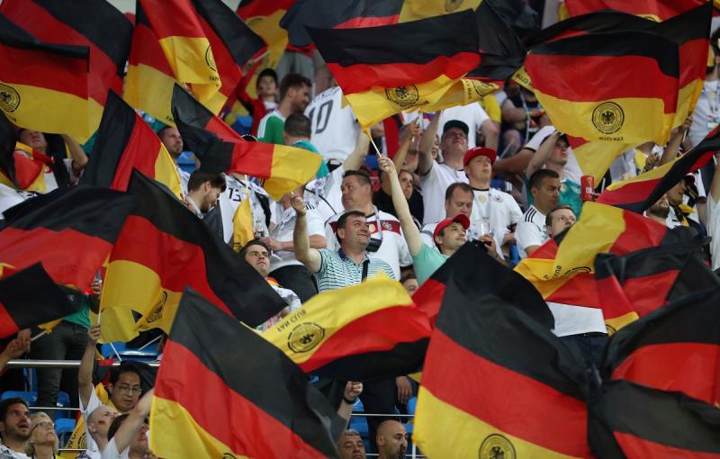 Football - World Cup - Group F - Germany vs Sweden - Fisht Stadium, Sochi, Russia - June 23, 2018 General view of Germany flags waved by fans in the stadium before the match REUTERS