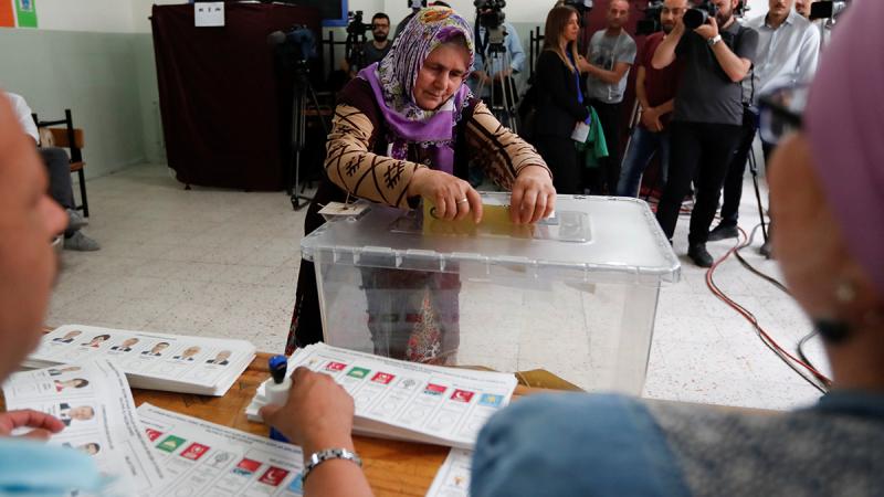 A woman casts her ballot during Turkey`s presidential and parliamentary elections at a polling station in Yalova, Turkey June 24, 2018. REUTERS