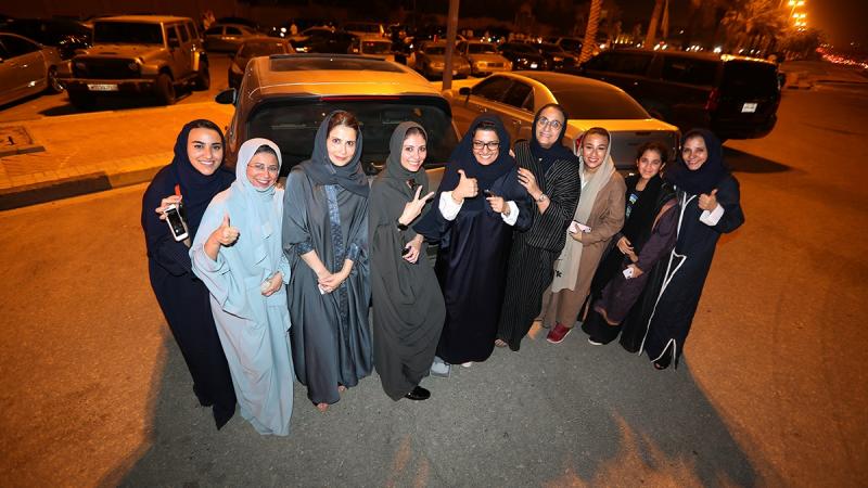Saudi women celebrate after they drove their cars in Al Khobar, Saudi Arabia, June 24, 2018. REUTERS