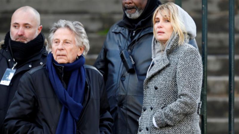 Film director Roman Polanski and Emmanuelle Seigner arrive at the Madeleine Church to attend a ceremony during a `popular tribute` to late French singer and actor Johnny Hallyday in Paris, France, December 9, 2017. REUTERS