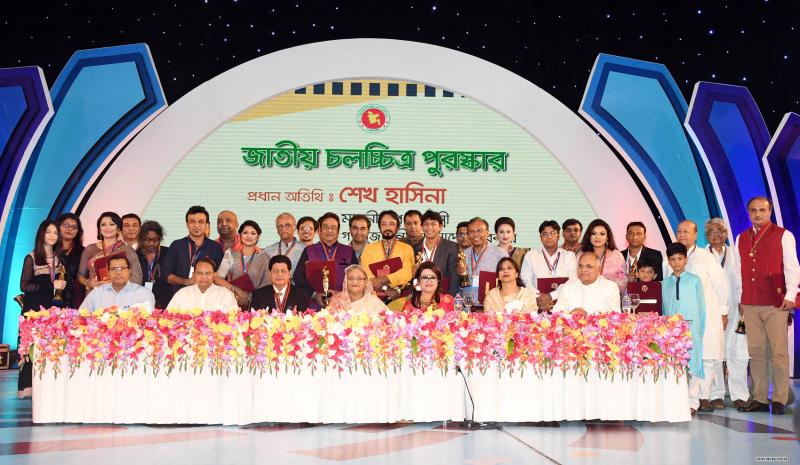Prime Minister Sheikh Hasina poses for picture with the winners of the ‘The National Film Awards-2016’ at Bangabandhu International Conference Centre (BICC) in the city on Sunday (Jul 8).