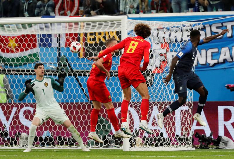 World Cup - Semi Final - France v Belgium - Saint Petersburg Stadium, Saint Petersburg, Russia - July 10, 2018  France`s Samuel Umtiti scores their first goal   REUTERS