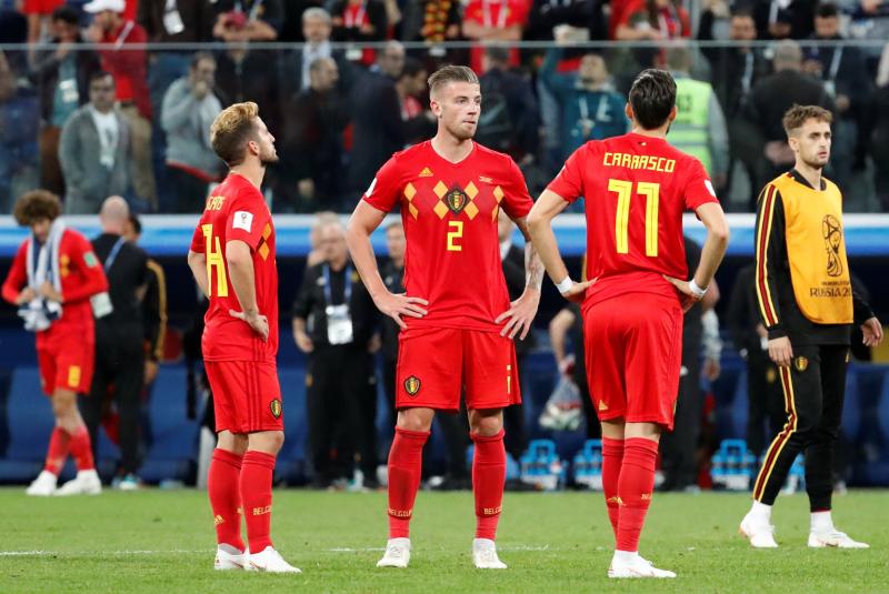 World Cup - Semi Final - France v Belgium - Saint Petersburg Stadium, Saint Petersburg, Russia - July 10, 2018  Belgium`s Dries Mertens, Toby Alderweireld and Yannick Carrasco look dejected after the match    REUTERS