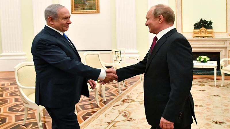Russian President Vladimir Putin shakes hands with Israeli Prime Minister Benjamin Netanyahu during their meeting at the Kremlin in Moscow, Russia Jul 11, 2018. REUTERS