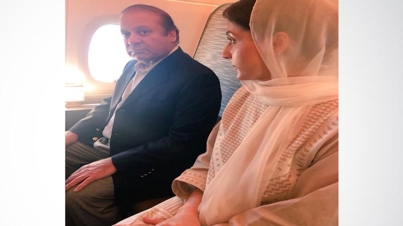 Nawaz Sharif on board a plane with his daughter Maryam. Twitter.