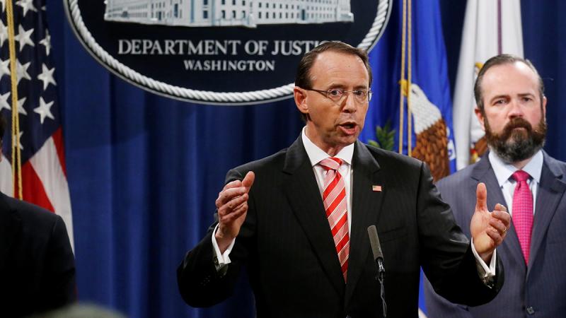Deputy US Attorney General Rod Rosenstein announces grand jury indictments of 12 Russian intelligence officers in special counsel Robert Mueller`s Russia investigation as he appears with Principal Associate Deputy Attorney General Ed O’Callaghan during a news conference at the Justice Department in Washington, US, July 13, 2018. REUTERS