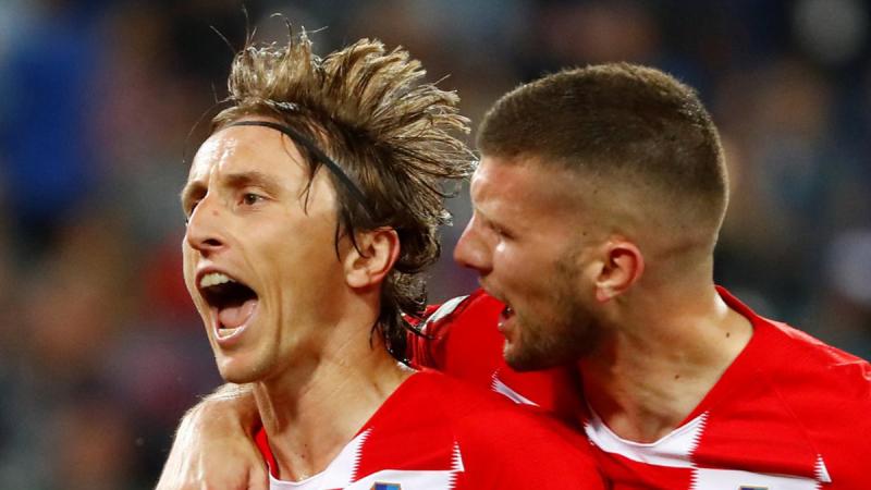 Luka Modric, left, celebrates with Croatia teammate Ante Rebic after converting a penalty against Nigeria that gave Croatia a 2-0 win at Kaliningrad Stadium. REUTERS