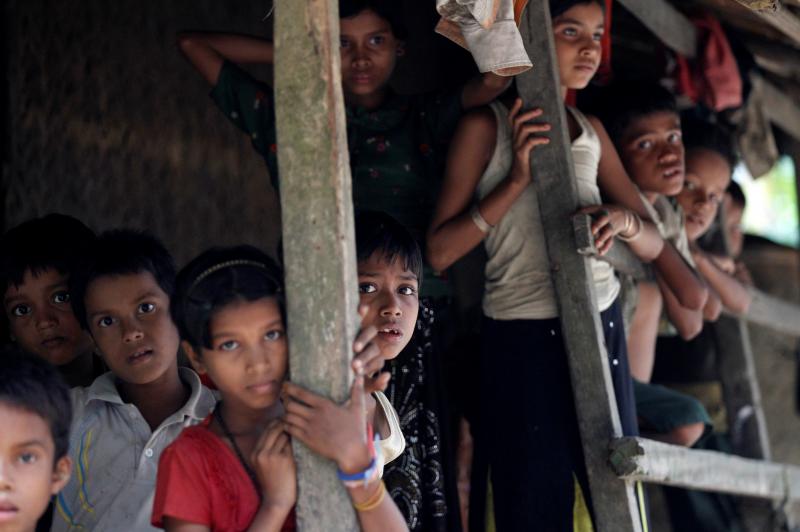 Rohingya Muslim children stand in U Shey Kya village outside Maungdaw in Rakhine state, Myanmar, on 27 October 2016. REUTERS