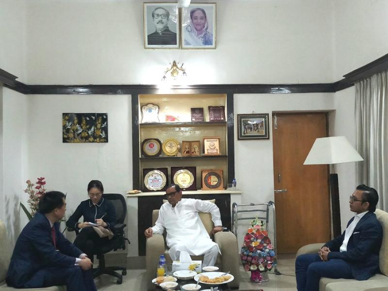 Social Welfare Minister Rashed Khan Menon and Chinese Ambassador to Dhaka Zhang Zuo discussing political situation in Bangladesh.