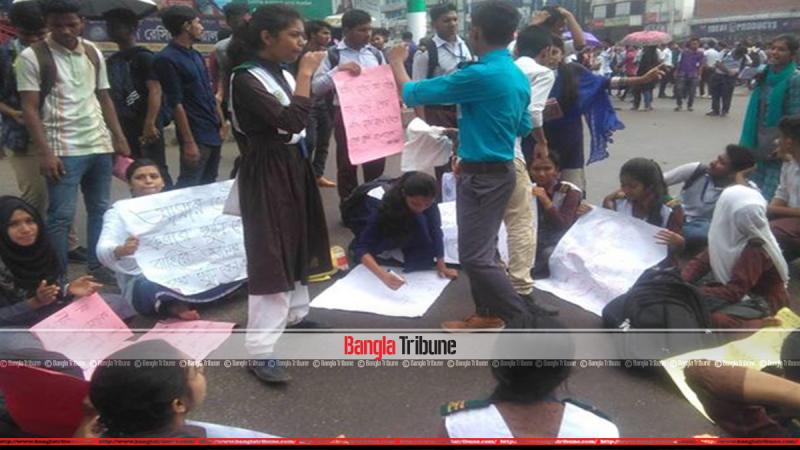 Students are carrying posters and chanting slogans.