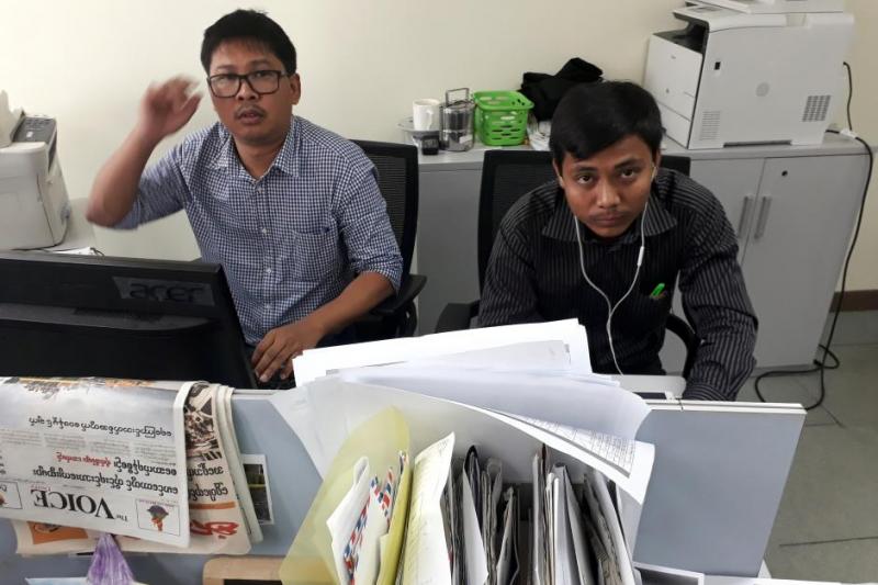 Reuters journalists Wa Lone (L) and Kyaw Soe Oo, who are based in Myanmar, pose for a picture at the Reuters office in Yangon, Myanmar. REUTERS