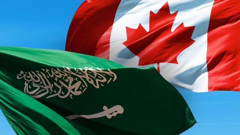 Flags of Saudi Arabia and Canada.