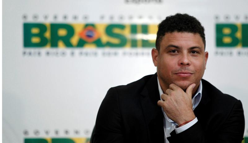 FILE PHOTO: Former Brazilian striker and administrative member of the World Cup`s local organizing committee Ronaldo speaks during a news conference about the update on preparations for the 2014 World Cup, in Brasilia, Brazil January 16, 2012. REUTERS
