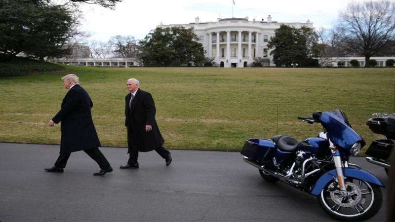 FILE PHOTO: U.S. President Donald Trump and Vice President Mike Pence leaves after meeting with Harley Davidson executives at the South Lawn of the White House in Washington US, Feb 2, 2017. REUTERS