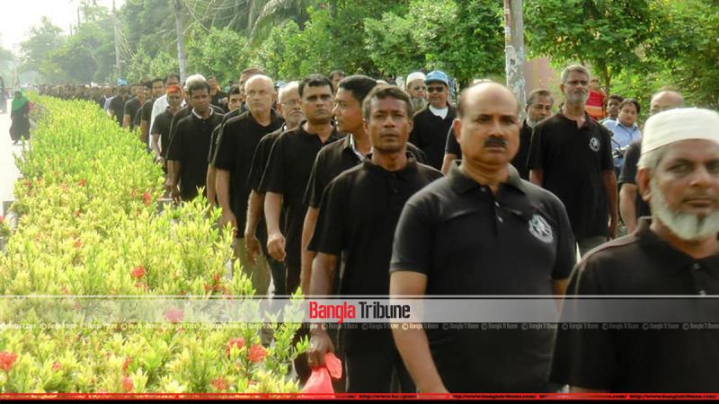 Rajshahi: People wearing black costumes marking the day.