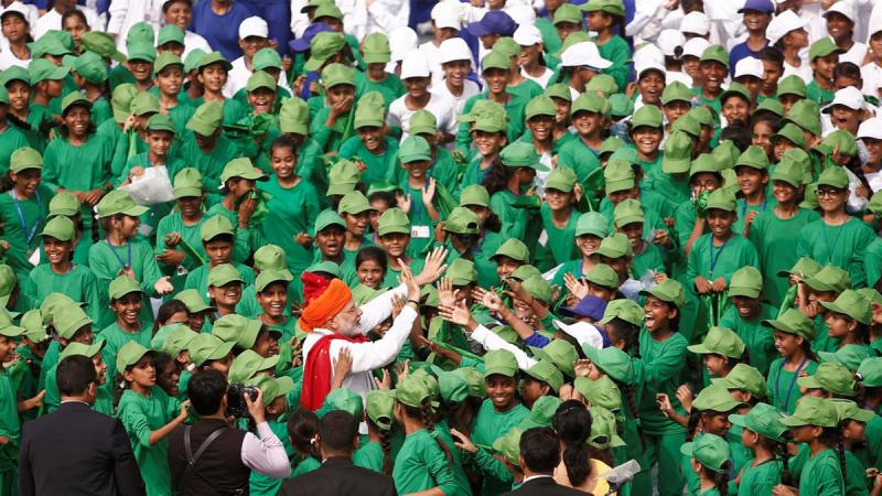 Indian Prime Minister Narendra Modi meets schoolchildren after addressing the nation during Independence Day celebrations at the historic Red Fort in Delhi, India, August 15, 2018. REUTERS