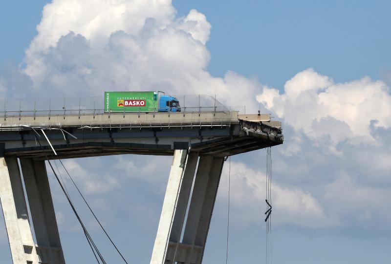 The collapsed Morandi Bridge is seen in the Italian port city of Genoa, Italy August 15, 2018. REUTERS