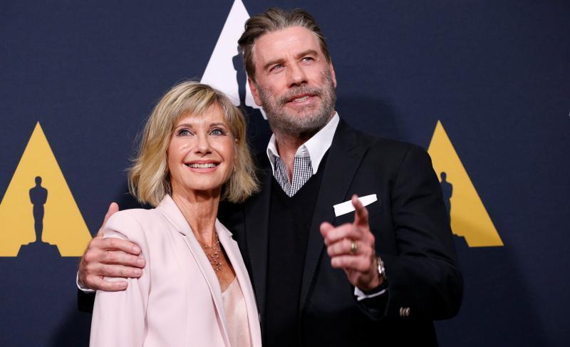 John Travolta and Olivia Newton-John pose at a 40th anniversary screening of `Grease` at the Academy of Motion Picture Arts and Sciences in Beverly Hills, California, US, August 15, 2018. REUTERS