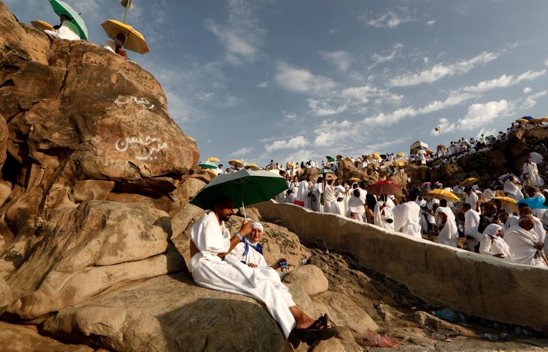 Muslim pilgrims gather on Mount Mercy on the plains of Arafat during the annual haj pilgrimage, outside the holy city of Mecca, Aug 20, 2018. REUTERS