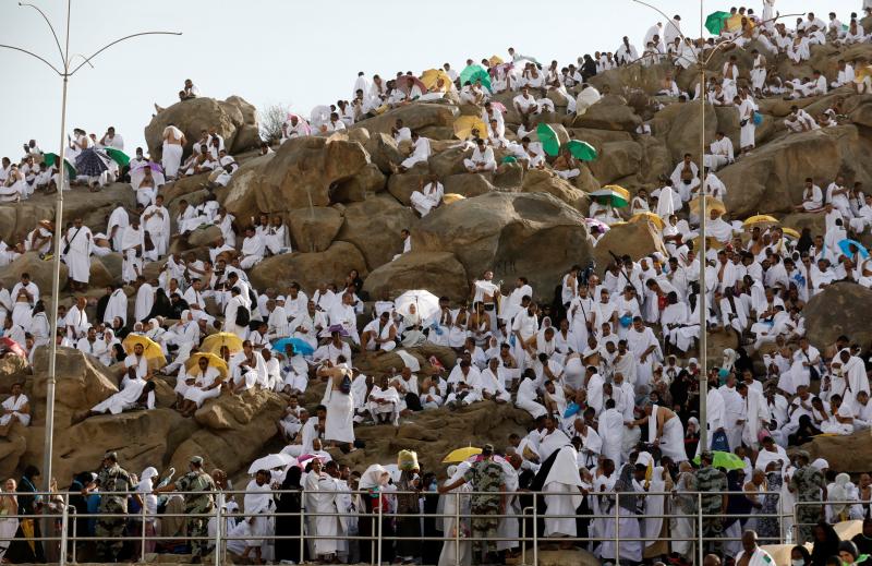 Muslim pilgrim gather on Mount Mercy on the plains of Arafat during the annual haj pilgrimage, outside the holy city of Mecca, Saudi Arabia August 20, 2018. REUTERS