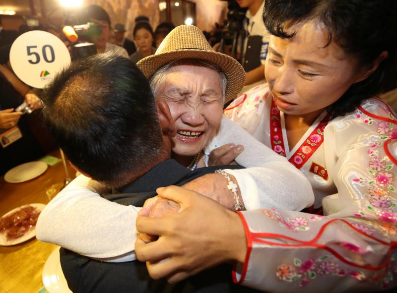 North and South Korean family members meet during a reunion at North`s Mount Kumgang resort, near the demilitarized zone (DMZ) separating the two Koreas, Aug 20. REUTERS