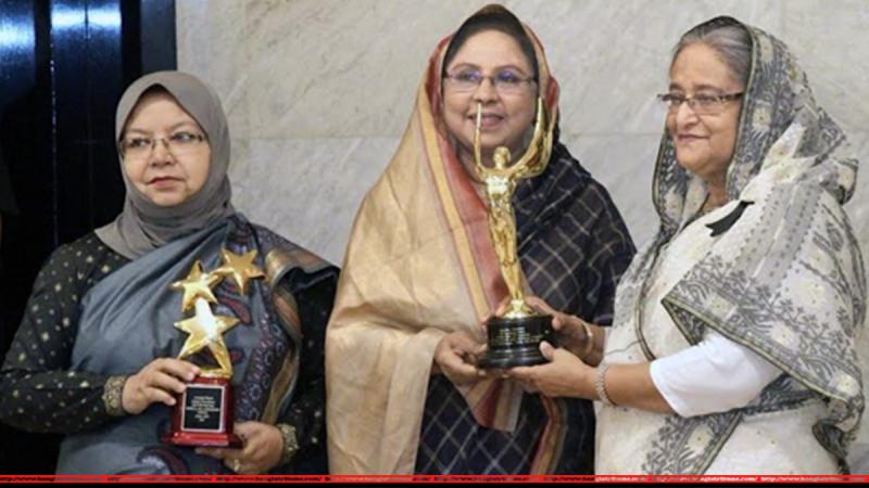 Prime Minister Sheikh Hasina receives two UNICEF awards for campaign against early marriage.