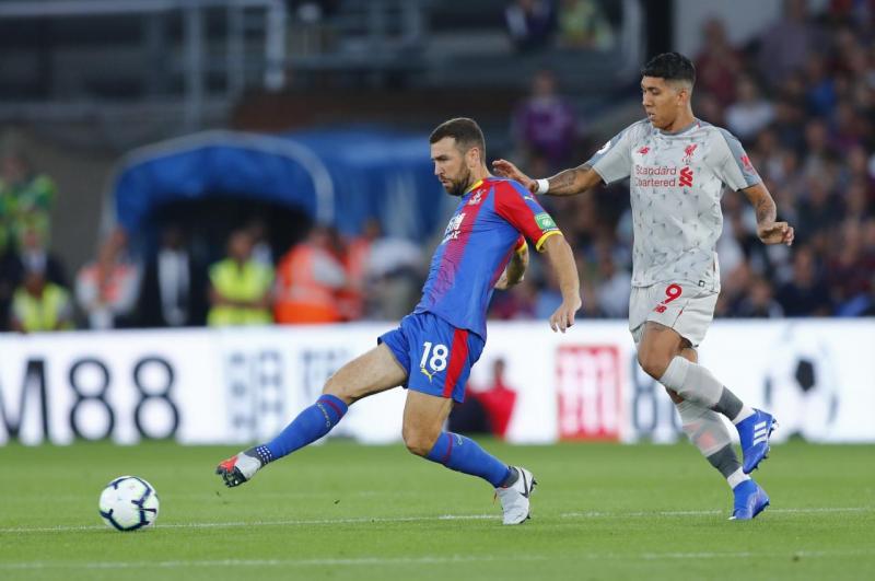Liverpool`s Roberto Firmino in action with Crystal Palace`s James McArthur at Selhurst Park, London, Britain on August 20, 2018. REUTERS
