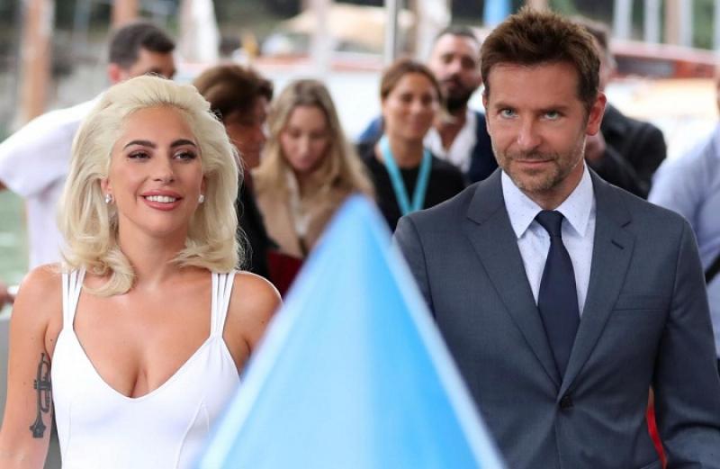 Director and actor Bradley Cooper with actor and singer Lady Gaga arrive at the 75th Venice International Film Festival at Venice, Italy on August 31, 2018. REUTERS