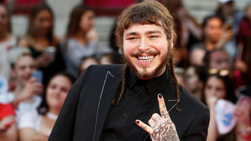 Rapper Post Malone arrives at the iHeartRadio MuchMusic Video Awards (MMVA) in Toronto, Ontario, Canada, June 18, 2017. REUTERS/FILE PHOTO