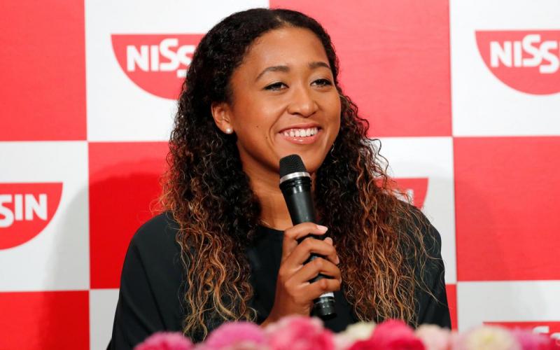 Naomi Osaka of Japan attends a news conference upon her arrival in Japan, after winning the women`s singles finals tennis match at the 2018 U.S. Open, in Yokohama September 13, 2018. REUTERS