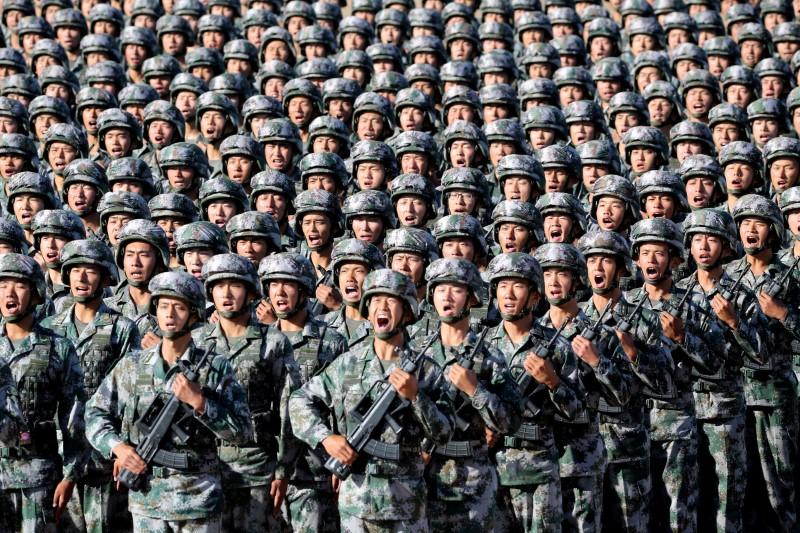 Soldiers of China`s People`s Liberation Army (PLA) get ready for the military parade to commemorate the 90th anniversary of the foundation of the army at Zhurihe military training base in Inner Mongolia Autonomous Region, China, July 30, 2017. REUTERS FILE PHOTO