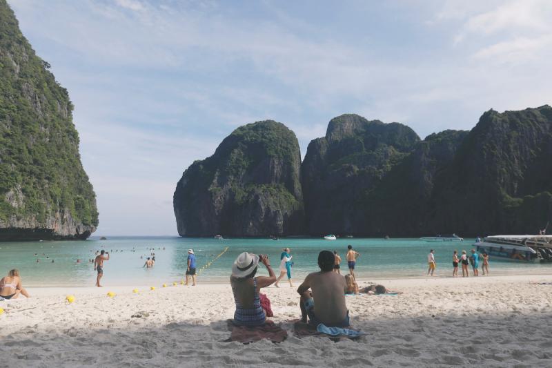 Tourists pass their time as they visit Maya bay at Krabi province, Thailand May 23, 2018. REUTERS