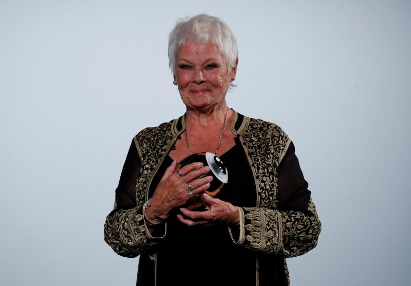 British actress Judi Dench smiles after receiving the Golden Icon Award at the 14th Zurich Film Festival in Zurich, Switzerland October 3, 2018. REUTERS