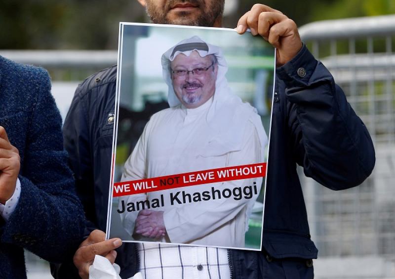 A demonstrator holds picture of Saudi journalist Jamal Khashoggi during a protest in front of Saudi Arabia`s consulate in Istanbul, Turkey, October 5, 2018. REUTERS/FILE PHOTO