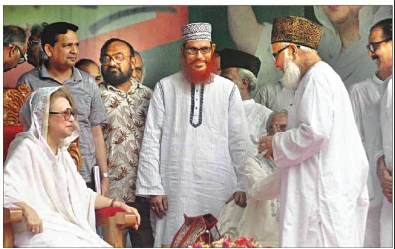 This 2010 file photo shows BNP chief Khaleda Zia with the leadership of Jamaat-e-Islami at a public rally in Dhaka.