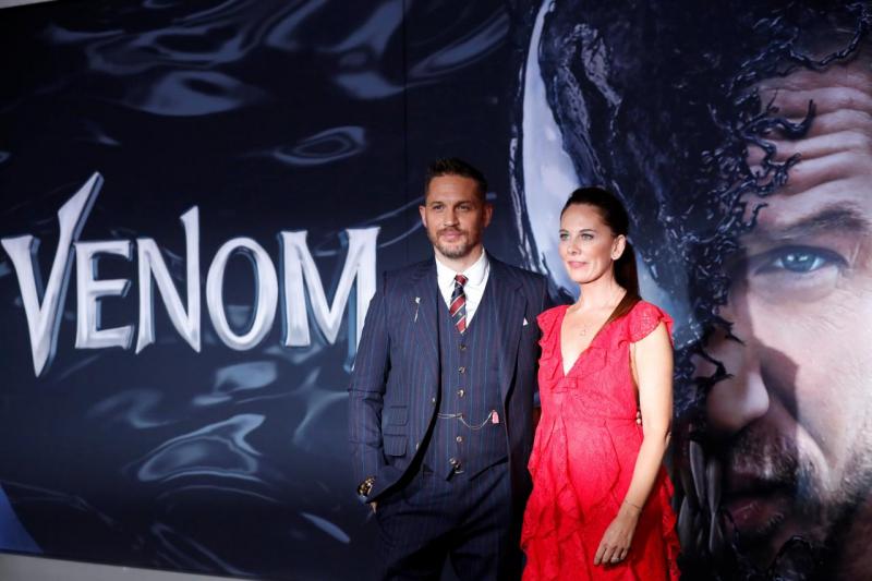 Cast member Tom Hardy and writer Kelly Marcel attend the premiere for the movie `Venom` in Los Angeles, California, U.S., October 1, 2018. REUTERS