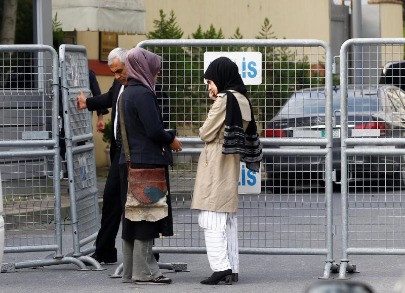 Fiancee (L) of Saudi journalist Jamal Khashoggi and her friend wait outside Saudi Arabia`s consulate in Istanbul, Turkey, October 3, 2018. REUTERS
