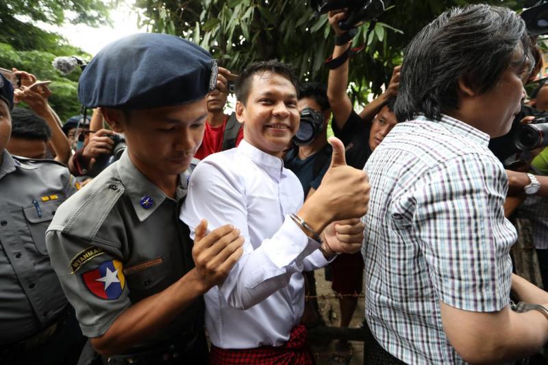 Phyo Wai Win, a reporter at Eleven Media arrives after being detained at Tamwe court in Yangon, Myanmar, October 10, 2018. REUTERS