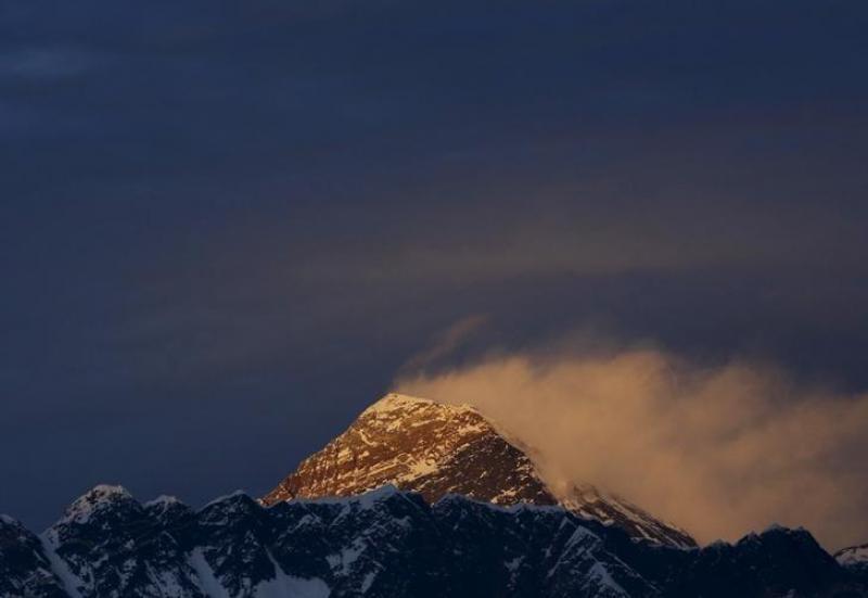 Light illuminates Mount Everest, during the in Solukhumbu District also known as the Everest region, in this picture taken November 30, 2015. REUTERS
