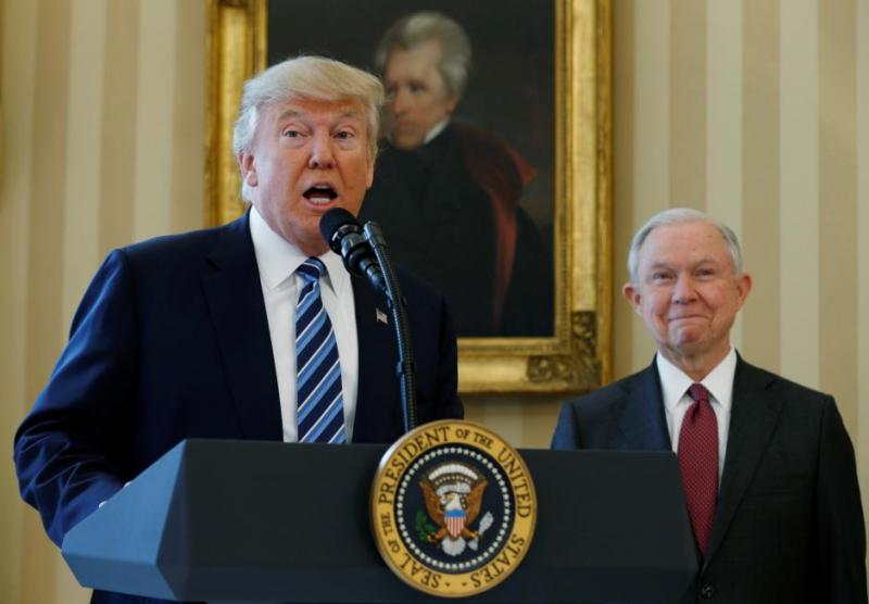 US President Donald Trump speaks during a swearing-in ceremony for new Attorney General Jeff Sessions (R) at the White House in Washington, U.S., February 9, 2017. REUTERS/FILE PHOTO